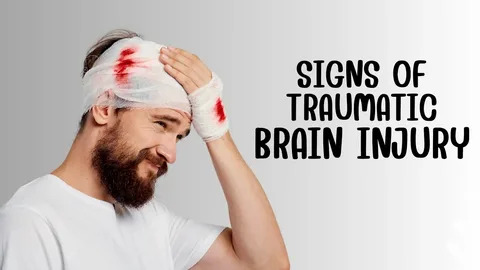 Man with a bandaged head showing visible injury, indicating symptoms of traumatic brain injury