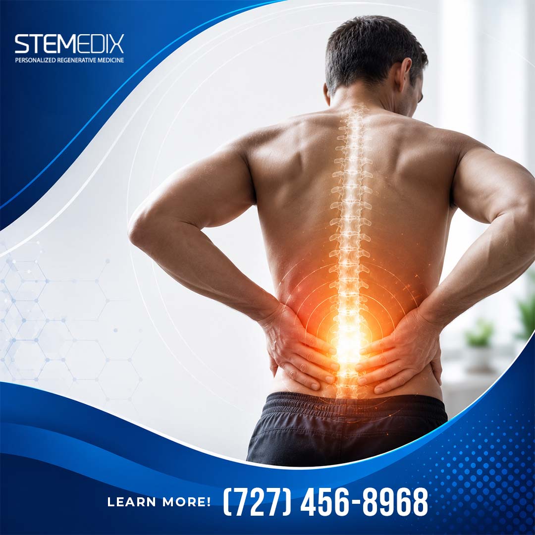 Shirtless athletic man holding his lower back with a glowing anatomical graphic highlighting spine inflammation and pain relief.